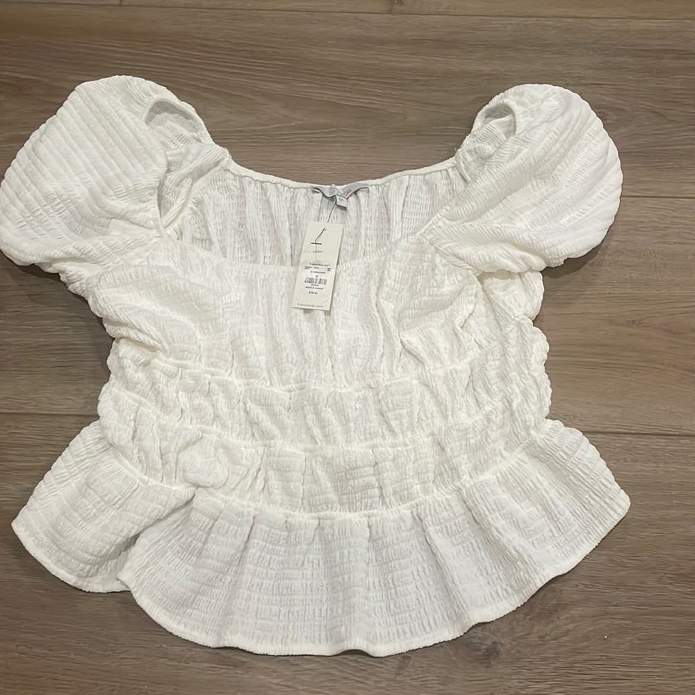Francesca’s Ruffled Peplum Blouse